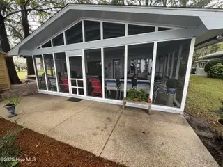 802 Canal Cove Road, Lake Waccamaw, NC 28450 – photo 13: Screen Porch