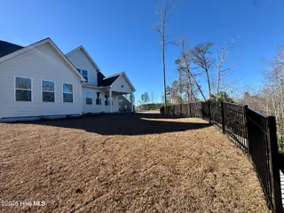 2012 Red Woodpeckers Court, Leland, NC 28451 — 3-bedroom home in Terrapin, Leland, NC, photo 18 of 23: Backyard