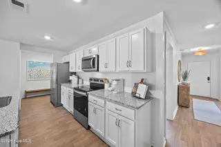 442 Hinton Lane SW 115, Ocean Isle Beach, NC 28469 – photo 6: DN- 4748 Pine Lake Dr SW- Wildflower- Ki