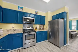 214 NE 50th Street, Oak Island, NC 28465 – photo 19: 18-web-or-mls-IMG_5507