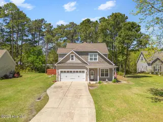 309 Chadwick Shores Drive, Sneads Ferry, NC 28460 – photo 1: DJI_20250416124040_0940_D