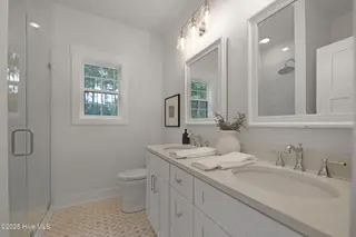 82 Northeast Drive NW, Calabash, NC 28467 – photo 17: 82NE Master bathroom with double vaniety