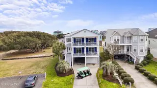 3617 W Pelican Drive, Oak Island, NC 28465 – photo 2: 4_drone