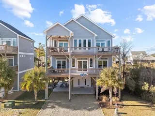 317 Oceanaire Lane, Surf City, NC 28445 – photo 1: DJI_20250114101130_0416_D