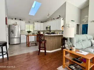 138 Loblolly Drive, Pine Knoll Shores, NC 28512 – photo 6: Living/Kitchen
