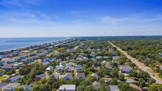 106 SE 44th Street, Oak Island, NC 28465 – photo 6: 72-web-or-mls-GI - 106 SE 44th St - List