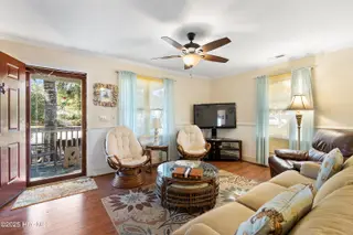 166 NW 7th Street, Oak Island, NC 28465 – photo 6: Living room