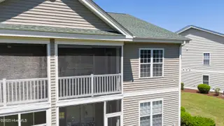 932 Great Egret Circle SW 3, Sunset Beach, NC 28468 – photo 3: mls-DJI_20250416130604_0695_D