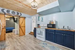 141 Pender Lane, Newport, NC 28570 – photo 23: Downstairs Studio - Kitchen