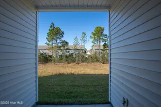 220 Sandpiper Place, Holly Ridge, NC 28445 – photo 4: 220 Sand Piper - Exterior - Edited