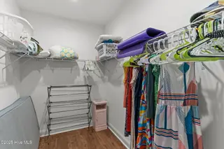 162 NW 9th Street, Oak Island, NC 28465 – photo 22: primary closet 1