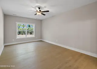161 Twining Rose Lane, Holly Ridge, NC 28445 – photo 13: main floor primary suite