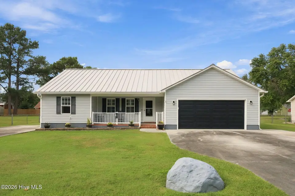 107 Fodder Drive, Hubert, NC 28539 — 3-bedroom home in Ole Mill Village, Hubert, NC, photo 1 of 59: 01_Front_Exterior