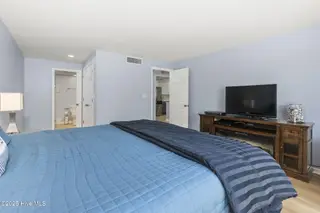 331 Salter Path Road 104 Beachwalk, Pine Knoll Shores, NC 28512 – photo 18: Large primary bedroom suite