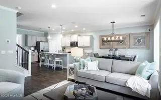 562 Glitter Bay Loop, Shallotte, NC 28470 — 4-bedroom home in Solserra, Shallotte, NC, photo 6 of 42: Gathering to Cafe & Kitchen