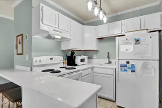 2210 New River Inlet Road Unit 254, North Topsail Beach, NC 28460 – photo 19: PJA13612