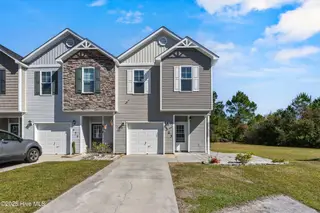 323 Cedar Island Trail, Holly Ridge, NC 28445 — 3-bedroom townhome in The Landing At Folkstone, Holly Ridge, NC, photo 1 of 36: 1_front exterior