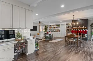 31 Cardinal Drive, Whispering Pines, NC 28327 – photo 23: kitchen into living space
