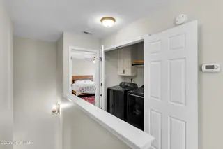 143 Tifton Circle, Cape Carteret, NC 28584 – photo 22: Upstairs Laundry