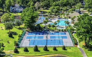 7504 Wallace Place SW 21, Sunset Beach, NC 28468 – photo 12: Ocean Ridge Pool Pickle Tennis