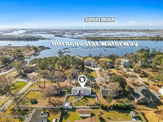 219 Shoreline Drive E, Sunset Beach, NC 28468 – photo 3: 68-web-or-mls-Cammediallc.com-