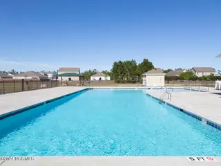 6338 Cowslip Way Unit 186, Leland, NC 28451 – photo 22: Seabrooke pool L33A2008-032-030-1280x960