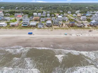 210 W Beach Drive, Oak Island, NC 28465 – photo 6: 6-web-or-mls-DJI_20250614140102_0271_D