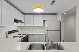 231 Saint Luke Court, Wilmington, NC 28409 — 2-bedroom waterfront townhome in Caneel Cove, Wilmington, NC, photo 11 of 38: 33-web-or-mls-BTS02046
