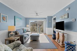1000 Caswell Beach Road Apt. 806, Oak Island, NC 28465 — 2-bedroom condo in Oak Island Bch Villa, Oak Island, NC, photo 18 of 56: Open Living Area