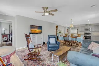 4901 Abbington Oaks Way SE, Southport, NC 28461 — 3-bedroom home in Groves at Southport, Southport, NC, photo 5 of 31: Living to Kitchen