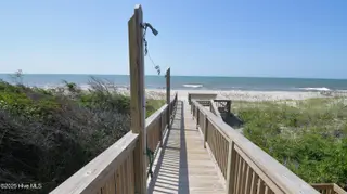 941 Ocean Boulevard W, Holden Beach, NC 28462 – photo 23: Shower On Boardwalk