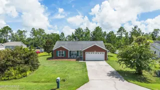 2947 Bay Village Street, Shallotte, NC 28470 — 3-bedroom home in Green Bay Village, Shallotte, NC, photo 1 of 33: Plenty of off street parking