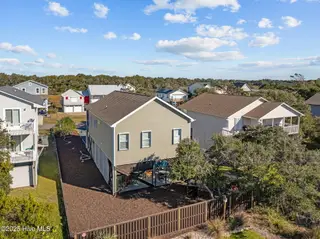 1903 E Pelican Drive, Oak Island, NC 28465 – photo 6: 9-web-or-mls-DJI_20251111082926_0629_D