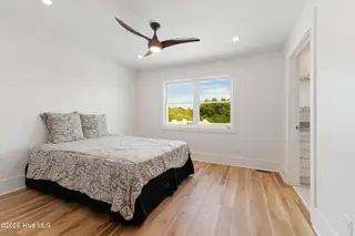 413 Club Colony Drive, Atlantic Beach, NC 28512 – photo 12: Primary suite