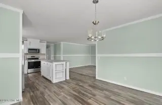 6823 Lewis Drive SE, Winnabow, NC 28479 – photo 9: Dining area