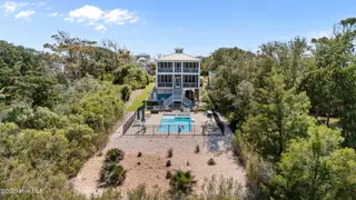 124 W Pelican Drive, Oak Island, NC 28465 – photo 5: 13-web-or-mls-DJI_20250925135504_0856_D