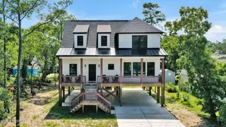 136 N Middleton Avenue, Oak Island, NC 28465 – photo 2: 136NMiddletonAvenueDrone-1