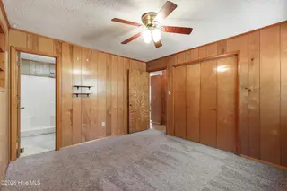 1021 Filmore Street, Southport, NC 28461 — 3-bedroom home in Boiling Spring Lakes, Southport, NC, photo 18 of 77: Primary bedroom