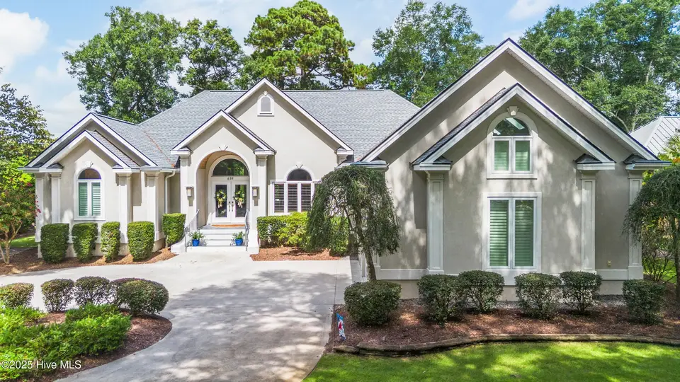 639 Oyster Bay Drive, Sunset Beach, NC 28468 – photo 1 of 70: Front View