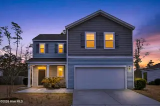 825 Seathwaite Lane SE, Leland, NC 28451 – photo 1: 825SeathwaiteLaneSE-1 Front Dusk