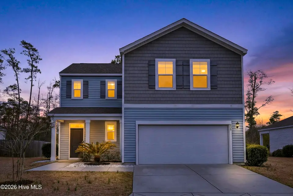 825 Seathwaite Lane SE, Leland, NC 28451 – photo 1 of 55: 825SeathwaiteLaneSE-1 Front Dusk