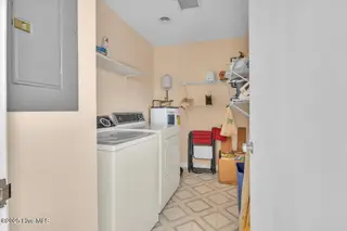 1708 W Beach Drive, Oak Island, NC 28465 – photo 17: 16-Final 1708 W Beach Dr OKI-RJREM-1847