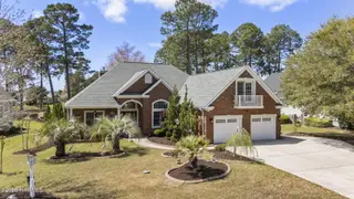 555 Stanton Hall Drive NW, Calabash, NC 28467 – photo 1: 1-web-or-mls-DJI_20260330131809_0023_D