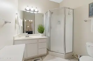 105 Beachwood Drive 1c Blue Water Condominiums, Atlantic Beach, NC 28512 – photo 17: Primary ensuite
