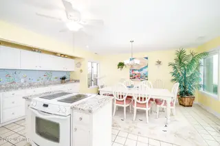 301 Salter Path Road 14 Genesis, Pine Knoll Shores, NC 28512 – photo 20: Spacious, eat-in kitchen w/ island