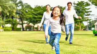 248 Maddox Drive, Aberdeen, NC 28315 – photo 18: Happy-Asian-Couple-Chasing-Young-Daughte