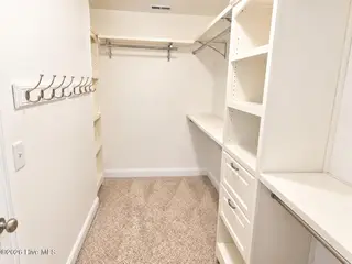 776 Jim Grant Avenue, Sneads Ferry, NC 28460 — 3-bedroom home in Grantwood, Sneads Ferry, NC, photo 16 of 20: JG closet 2