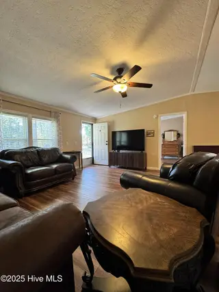 211 Beachwood Drive NW, Calabash, NC 28467 — 3-bedroom manufactured home in Ocean Forest, Calabash, NC, photo 17 of 75: living room 2