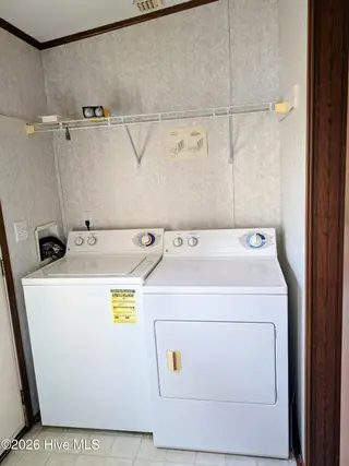 3120 Mobleys Bridge Road, Grimesland, NC 27837 – photo 6: Laundry off Kitchen
