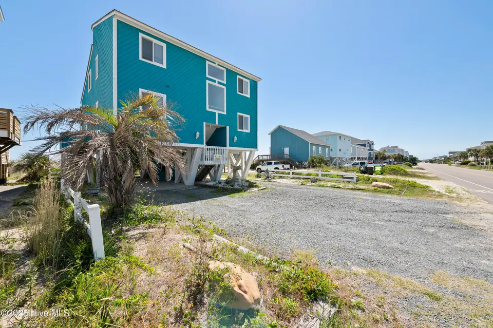 1123 E Beach Drive, Oak Island, NC 28465 – photo 1 of 47: mls-RIC_4627